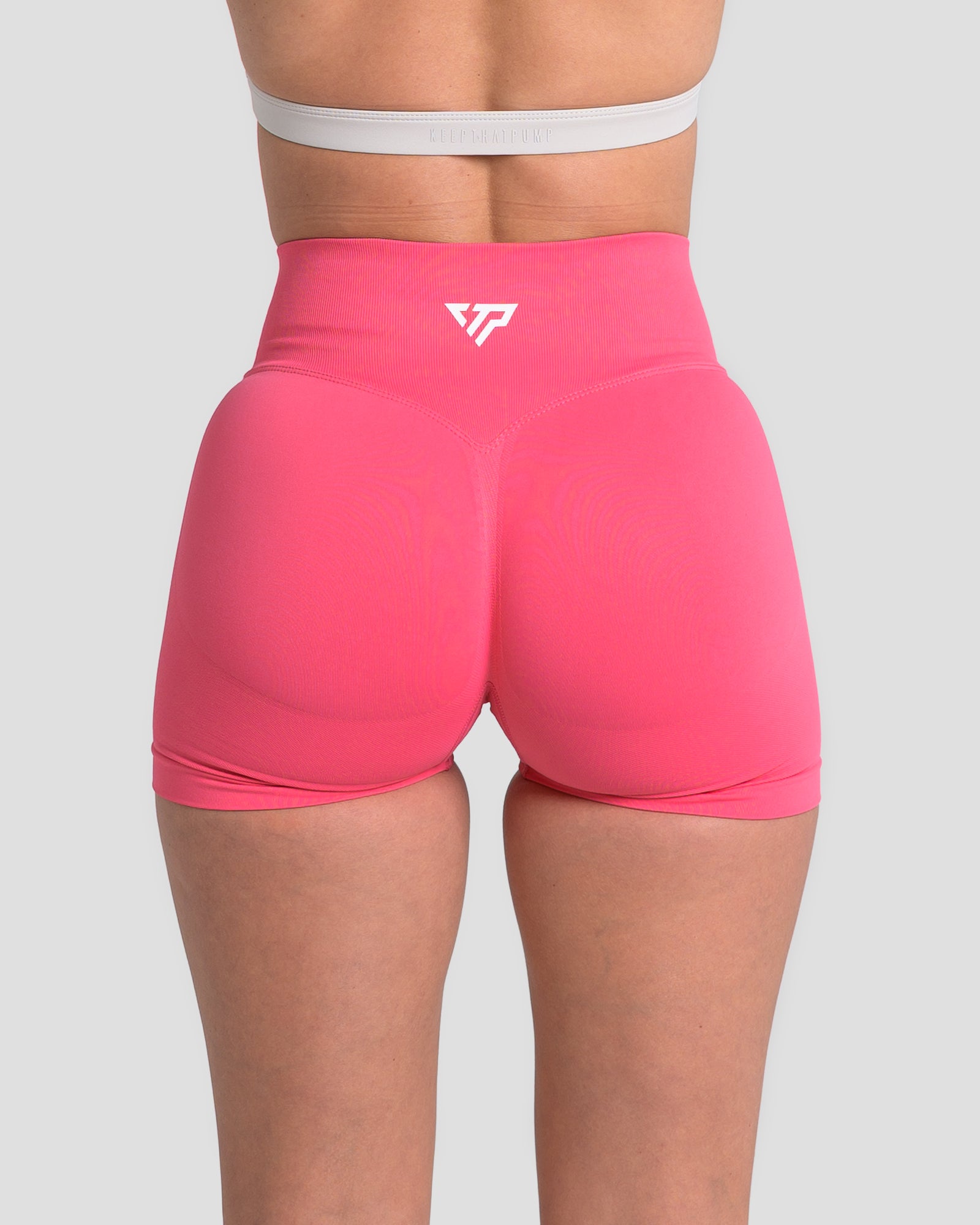 RECOIL HIGH WAIST SCRUNCH SHORTS - DARK CORAL